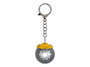Llavero con disco de freno Porsche, amarillo. - WAP0503700PSAB