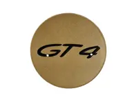 Tapacubos con logotipo "GT4" en color oro brillante. Porsche 718 (982) Cayman GT4