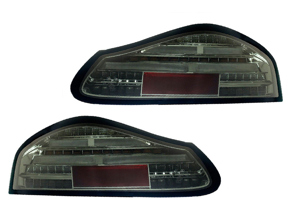 LED-richtingaanwijzerunit achter, zwarte omtrek / rookkleurige lens. Porsche 986 Boxster - 98663144504, 98663144604, 00004490067 - EU-74-BOX-R-17